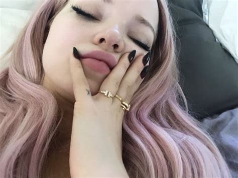 Dove cameron spoke out to confirm the rumours that she and thomas doherty have split after four years, telling fans that they remain friends. dove cameron, 2020