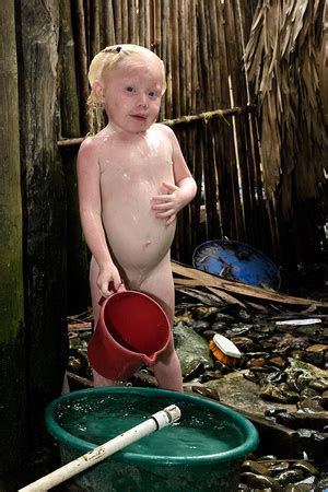 There might also be bathtub, bathing tub, bath, and tub. Vanishing Cultures Photography | Children of the Moon ...