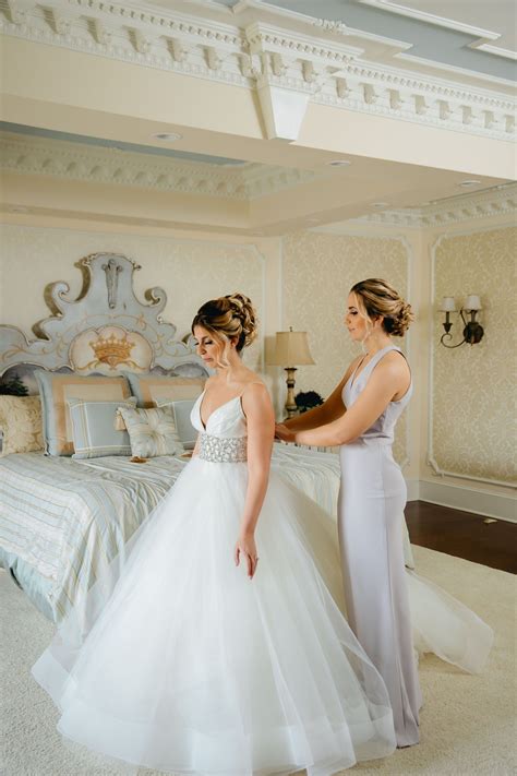 Our breathtaking bride getting ready with one of her bridesmaids who ...
