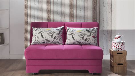 A sofa with storage is a great way to hide your clutter in plain sight. Twist Optimum Fuchsia Love Seat Sleeper with Storage by ...