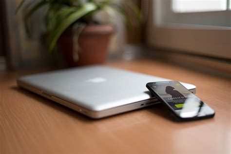 Hd phone wallpapers download beautiful high quality best phone background images collection for your smartphone and tablet. Smartphone Beside Silver Macbook on Brown Wooden Table With Potted Plant in the Background ...