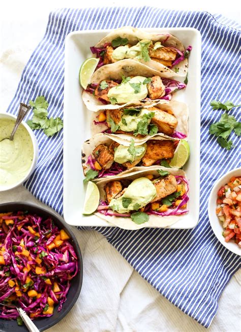 A californian classic which you can master with this delicious fish taco recipe. Baja Fish Tacos with Mango Slaw and Avocado Crema | Recipe ...