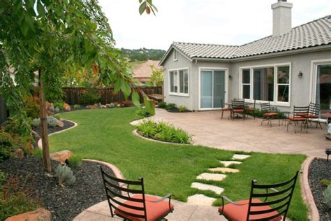 Enchanting cottage backyard with paver patio walkway, natural rock pond and cozy sitting areas. 18 Simple and Easy Rock Garden Ideas