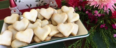 They take after chocolate crinkle cookies, but are a delightful refreshing lemon flavor sprinkle with powdered sugar. German Lemon Heart Cookies | Traditional Christmas Cookies