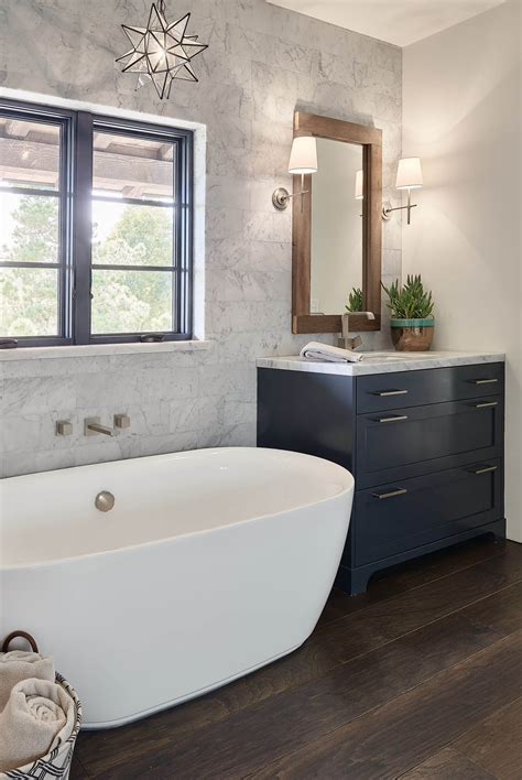 What is a freestanding bathtub? Stand alone tube with hanging star chandelier | Park and ...