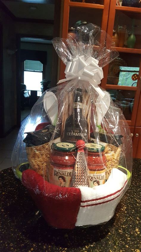 This elaborate gift basket is full of foods and ingredients associated with italy. Pasta gift basket | Pasta gifts, Gift baskets, Gifts