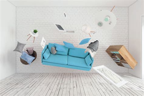 The car garage is next to the backyard. Living Room Interior Furniture Flying Around Stock Photo ...