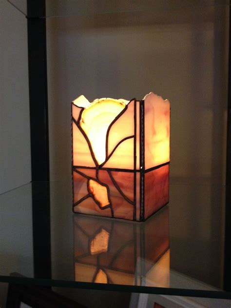 #stained glass #succulents #handmade #ring dishes #candle holders #etsy. Stained glass candle holder surrounds a natural rock gem ...