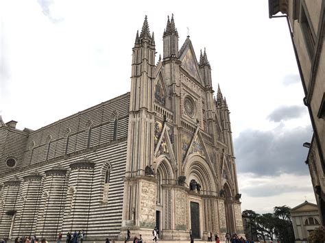 Duomo, orvieto the facade of what may be the most beautiful gothic church in italy is a confection of polychrome marble, all pointed arches and spiky photo by vanessa berberian. Duomo di Orvieto - the facade is considered a masterpiece ...