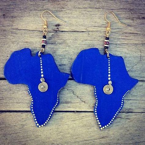 For over 500 years, this shape has evolved and adapted. ON SALE African Jewelry, Africa Shaped Earrings, Wooden Earrings, Zulu Earrings, African ...