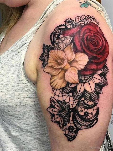 The rose tattoos are surrounded by beautiful symmetrical dark motifs. Pin by Lora Brown on tattoos | Lace rose tattoos, Tattoos ...