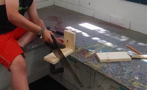 This is a great beginner project. Child making something at cub scout camp DIY woodworking ...