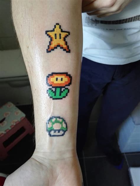 See more ideas about pixel tattoo, gaming tattoo, gamer tattoos. My new pixel semi sleeve, 8 bit, pixel tattoo | Gaming tattoo, Pixel tattoo, Nintendo tattoo