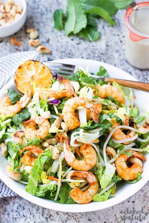 This thai shrimp salad packs tons of flavor with fresh herbs and an almond butter thai salad dressing. Healthy Grilled Asian Thai Shrimp Salad Recipe | Wicked Spatula