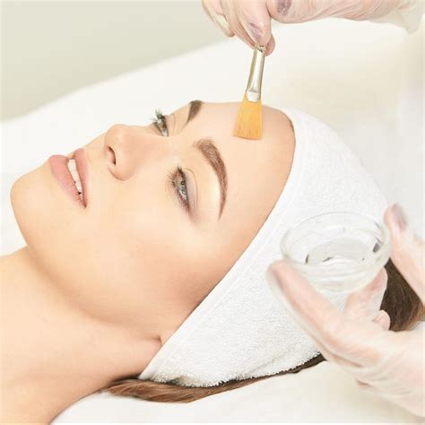 Facial brush peel retinol treatment. Beauty woman peeling procedure ...