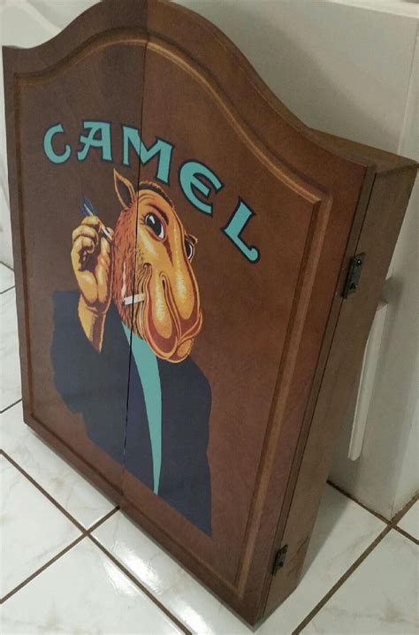 The size of the ad is approximately 11x16.5inches. Vintage Joe Camel Cigarettes DartBoard & Wooden Cabinet ...