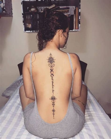 Flowers spine tattoos for women. 42 Spine Tattoos That Are Elegant And Beautiful | Spine ...