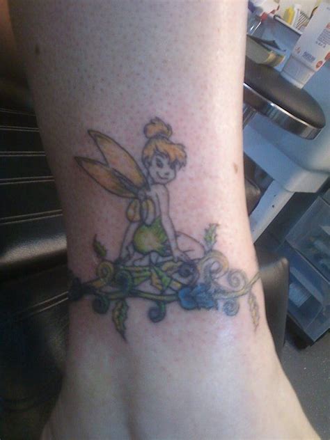 my tinkerbell tattoo disney tattoos tattoos paw print tattoo