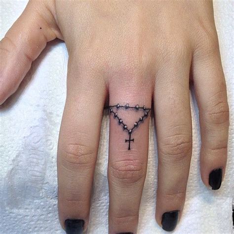 For some brilliant ideas, here are several beautiful cross tattoos to draw inspiration from. Ring Tattoo | Tattoo Ideas and Inspiration | Cross finger ...