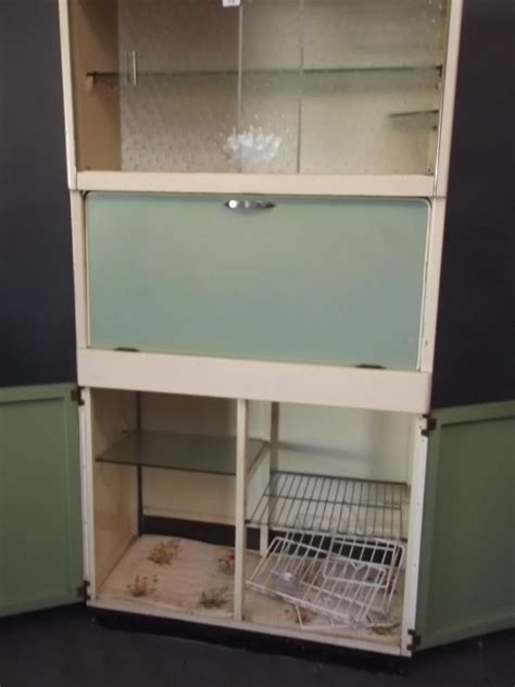 Maybe you would like to learn more about one of these? A 1950s 'Eastham' kitchen cabinet with fold down work ...