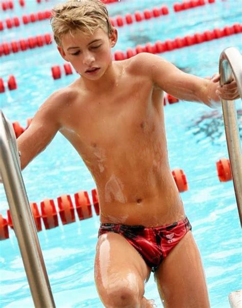 Cute boys have fun unter the pool shower. Young, blond, weird | Speedo boy, Boys swimwear, Kids ...