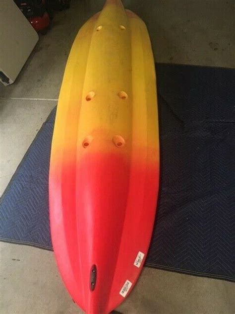 Removable seat, storage hatch, tie downs, weighs 47 pounds. Ocean Kayak Scrambler 11