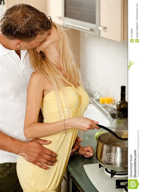 Amateurs make hot love at home !! Love In The Kitchen Stock Images - Image: 11116984