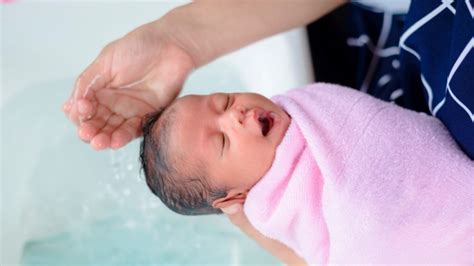 Kid in the bath laughs then says help ­. Delaying baby's first bath could help with breastfeeding ...