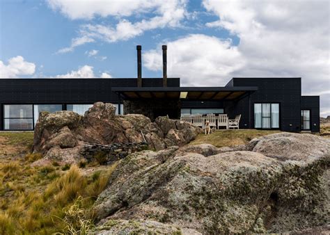 Mariana cordoba, even the name turns up the heat in the room! Black corrugated metal covers this residence designed as a ...