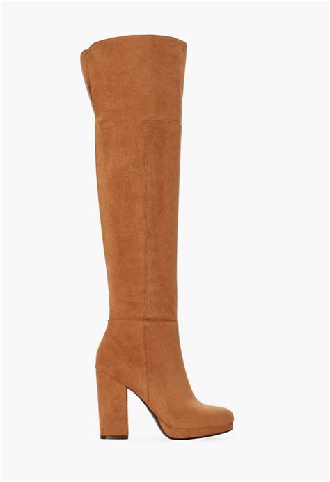 We could buy normal size boots and stuff them with cash to fill out the calves and still have money left over, lol! Tarja Block Heel Over The Knee Boot in CAMEL - Get great ...