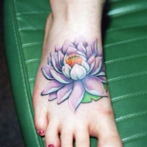 This lotus has been tattooed onto the foot with a mixture of solid lines and dots. 37+ Lotus Tattoos On Foot