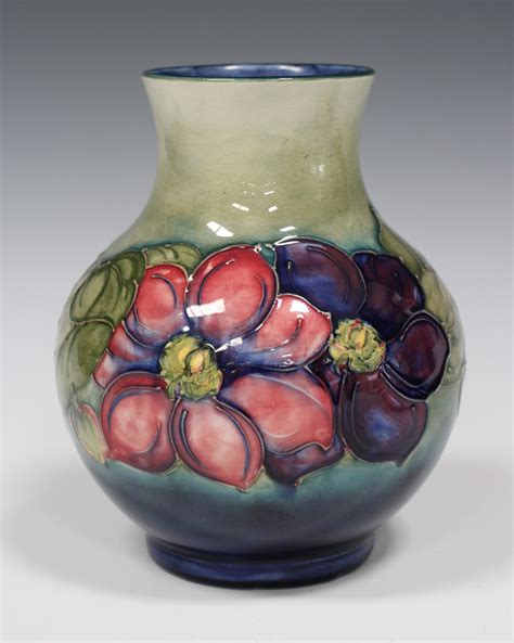 People who like the forms and colours of flowers can find many pottery selections in moorcroft collections of florian and structured or broad florals. A Moorcroft pottery vase, mid-20th century, the baluster ...