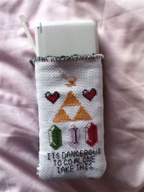 Learning to embroider is not as tough as you might think! Legend of Zelda Cross Stitch 3DS holder | Cross stitch ...