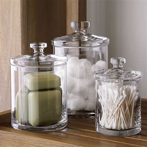 If you have a small apartment or home these storage solutions are your answer. Glass Canisters | Crate and Barrel | Simple bathroom ...