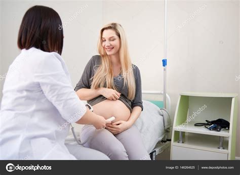 One in 200 women in the u.s. Pregnant woman having ultrasonic scanning at the clinic ...