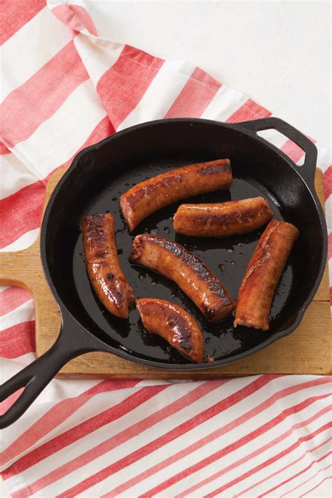 Conecuh sausage wrapped in bacon sprinkled with brown sugar and cooked at 300 until the bacon is crisp. Cast-Iron Skillet Conecuh Sausage - Conecuh Sausage