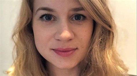 A photograph of sarah everard sits among the floral tributes and candles placed in clapham common in london on march 15. Sarah Everard search: Police officer arrested in Kent
