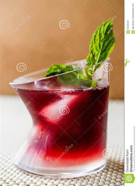 This easy to make layered drink is a sweet blend of coconut rum, pineapple, and grenadine. Malibu Sunset Cocktail With Mint Leaves. Stock Image - Image of alcohol, raspberyy: 97225447