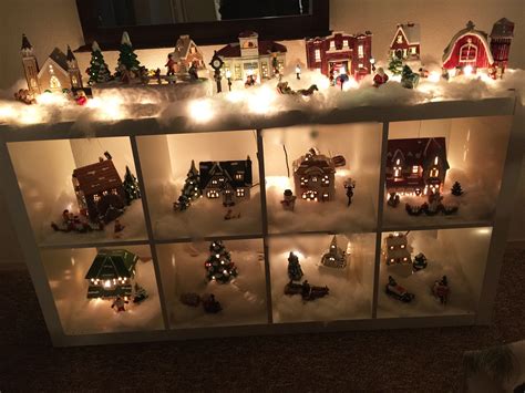 Schneider suggests that villages should be stored having a few extra ornament hangers, twist ties and zip ties on hand never hurts. A creative way to display a Christmas Village using a ...