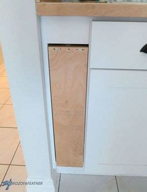 How to install a blind base (kitchen cabinets) in a corner. DIY Hidden Kitchen Storage: Turn a Filler Panel Into a ...