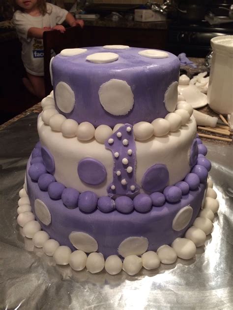 There is no remedy for love but to love more. Lavender/purple/white polka dot fondant 1st birthday cake ...