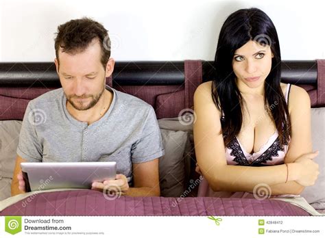 Wifey gets plastered with masterblaster jizz. Beautiful Woman Bored About Husband Playing With Tablet ...