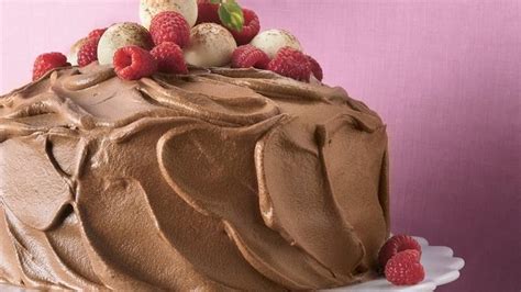 Immediately pour over chocolate and jello; Chocolate Mousse-Raspberry Cake recipe from Betty Crocker