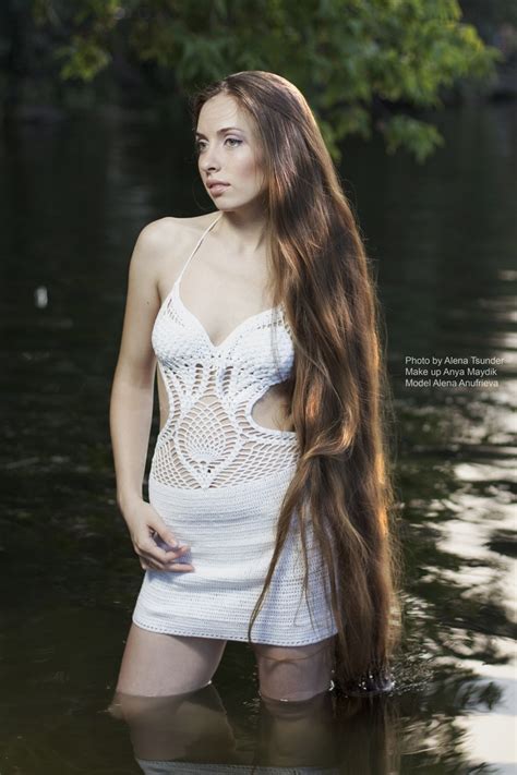 All the details of a very careful shampoo and head massage and, at the ending, a session of combing all mane before start styling. Long hair girl shows off her floor length hair|Girls with ...