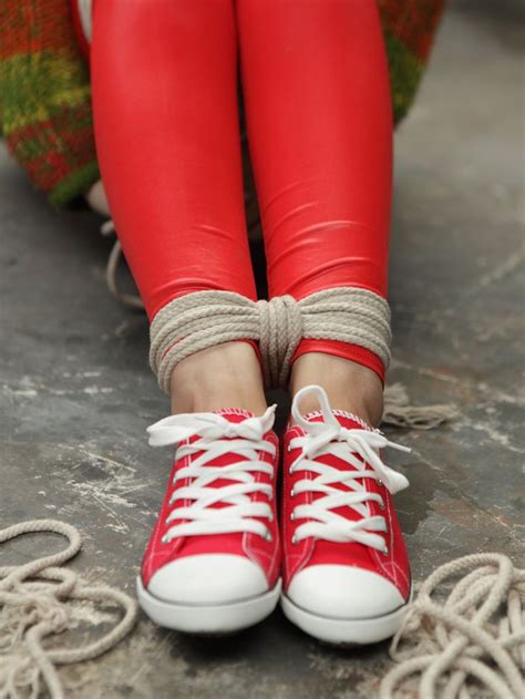 42% off 1 pair outdoor hiking shoe covers snowproof waterproof mud proof anti bite snake guard leg protection leggings 0 review cod. Woman in red leggings, red cotton sneakers, rope tied feet ...