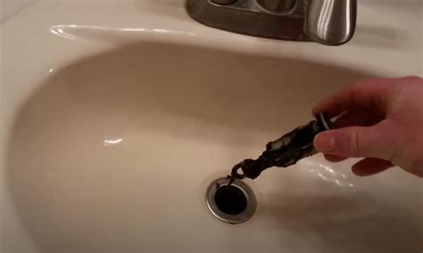 You've had a tough day and finally have a little time to unwind. How To Unclog Bathroom Sink Remove Stopper - Image of ...