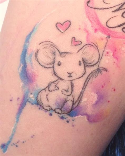 Kelly is a busy artist and she only tattoos around half the week. mouse watercolor tattoo carolina avalle