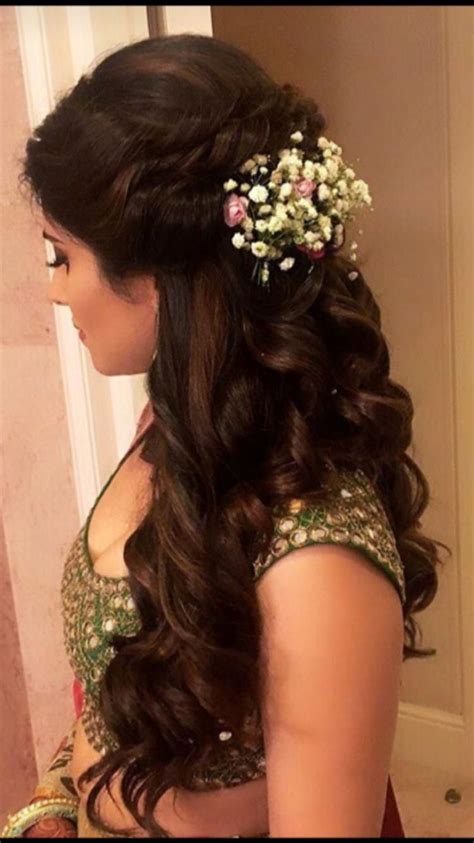 From flower braids to accessorized buns, here are our favorite ideas for reception hairstyles for brides and hairdos for indian wedding guests. Hairstyle wedding latest #indianweddinghairstylesbuns | Engagement hairstyles, Bride hairstyles ...