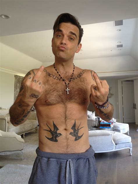 The official instagram page for robbie williams: Robbie Williams Tattoos - Celebrities Tattooed