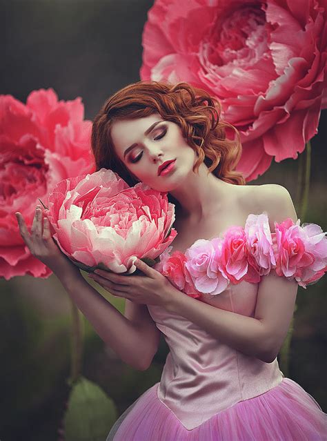 Disney princess with pink flowers in hair. Beautiful Girl With Red Hair Near Giant Peony Pink Flowers ...